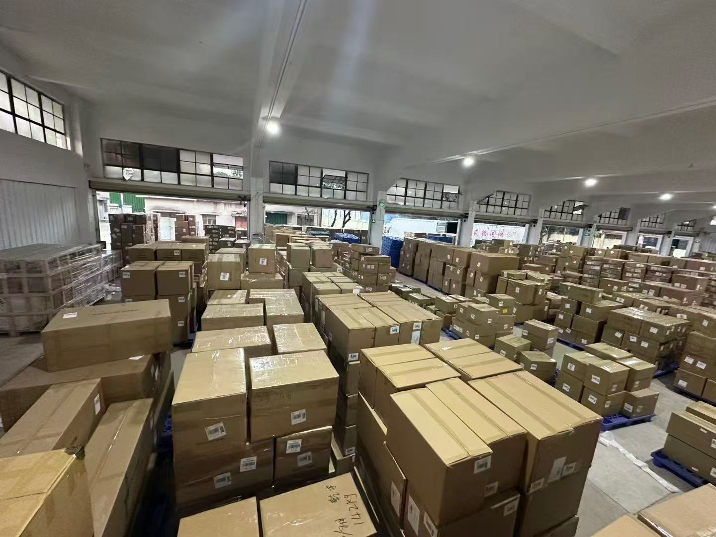 Pallets of packed cartons inside a DropFulfill partner warehouse in Canada